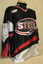 Chicago Steel #14 Inaugural Season 2000-01 This Inagural season, 2000-01, black jersey was worn by Alexander Ivanov. USHL Chest crest & NOB. Made by Gemini, it is a size 54. 