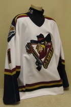 Green Bay Gamblers Jure Penko Alternate white #1. This one was worn by goalie Jure Penko. A special auction alternate, it shows a bit of wear and is autographed on the back number. Drafted by the Nashville Predators. It is the biggest size 56 I have ever seen. Sold Oct 2010 to roy33. Note logo and numbers on sleeve.