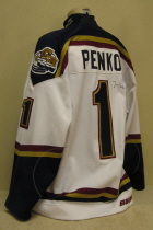 Green Bay Gamblers Jure Penko Alternate white #1. This one was worn by goalie Jure Penko. A special auction alternate, it shows a bit of wear and is autographed on the back number. Drafted by the Nashville Predators. It is the biggest size 56 I have ever seen. 