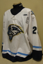 A.J. Penchenko Indiana Ice 2004-05 White #20 This one was worn by defenseman A.J. Penchenko during the inaugural season of the Indiana Ice USHL hockey team. This size 58 by SP has great wear. Also has captain "C" with SP logo on left chest and Ice patches on both shoulders.