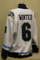 Travis Winter #6 Indiana Ice 2004-05 White #6. This one was worn by defenseman Travis Winter during the inaugural season of the Indiana Ice USHL hockey team. This size 58 by SP has great wear. Also has alternate captain "A" with SP logo on left chest and Ice patches on both shoulders.