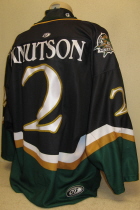 Patrick Knutson #2 Black 2000-01 Worn by Pat Knutson during the 00-01. This away gamer shows some wear. Made by OT Sports it is sized XL.