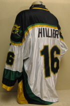 Justin Hillier #16 White 1999-2000. Worn one season by Justin Hillier. This homer is made by K1. Shoulder patches, NOB, USHL crest and nice wear on 'Dazzle