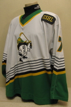 Jeff Carlson white #7 1996-97 This one was worn during the 96-97 season by Nick Tietjen. NOB and yellow on black USHL chest patch. This away sweater is made by CCM and is a size 52.