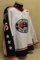 Worn for both seasons in Columbus. The inaugural season worn by Zac MacVoy. The second season seanon worn by Luke Witkowski. Tie down front, SP logo on fron tleftchest and on right rear hem. Teir 1 logo also on left rear hem. Size 56 Made by SP