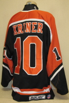 Looks like this gamer was worn by Drew Krinner during the 97-98 season. However, all rosters have him wearing # 9. Any lancer fans have any input here??? USHL crest on front and Bauer Tag and round USHL logo on rear hem, NOB. Shows nice overall wear. Made by Bauer, size 54. 