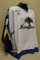 Jake Wilkens Sioux Falls Stampede 2001-02 #8 Worn during the 2001-02 USHL season. Shows great wear. Made by Gemini and is a size 54. NOB, shoulder patches, USHL & Gemini Crest on front. This style of jersey was worn for the first four seasons. 1999-2000 was Sioux Falls' first season in the league. 