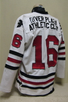 Waterloo Black Hawks White #16 Circa 1995. This is one of the old style Hawks jerseys. It is #16 and has NNOB rather a sponsor, The River City Athletic Center. It has the famous "Doves" on the shoulder and of course the original logo. Manufactured by Hooters Sportswear and is a size large. 