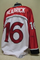 Waterloo BlackHawks #16 2001-02 White This one was worn during the 2001-02 season by Zac Headrick. Has tons of wear as it was used for this and the previous season. Manufactured by SP, it is size 56. 