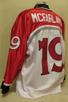Waterloo BlackHawks #19 2001-02 Home This one was worn during the 2001-02 season by Jeff McFarland. This one has tons of wear as it was used for this and the previous season. Manufactured by SP, it is size 56.