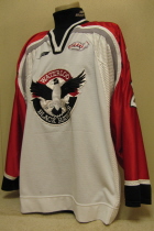Waterloo Black Hawks White #2 Andrew Alberts. This one was worn for two season by Andrew Alberts 99-00 and 00-01. It is made by Bauer and is a size 56. It also has the 'Hawks alternate shoulder logo and the Bauer and USHL chest crests.