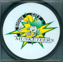 These pucks were given away during the 1997 baseball season during a joint promo between the Musketeers and the Sioux City Explorers (Northern League Baseball team). Baseball fans are more polite than hockey fans...on puck night, none found the field, however, baseball night was a different story, several found the ice that evening!!! Reverse features the Explorers logo.