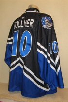 This one was worn breifley durnig the 2007-08 season by Kyle Follmer. Worn for the first 12 games, these black jerseys were replaced due to jersey desing and numbering. Because of the star design on back, only 10" numbers fit on the back. They were replaced with 12" numbers. Has Teir 1 and Flag patches on front and Capitol shoulder patches. This is made by OT Sports and is a size 56.