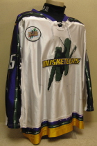 Worn during the 05-06 season by Kevin Lohry. This #15 jersey was worn by Sioux City native shows lots of wear. Kevin started his hockey career in the Sioux City Youth program and played all through high school. Kevin split his senior year between the Metros and Musketeers. The following season, 2005-06, he would earn a full time spot on the Musketeer rooster and the next season, 2006-07, he would go on to be named alternate captain and, secure a scholarship at Princeton University. All-Star Game Patch and NOB . Manufactured by OT Sports, this size 56 shows great wear. 