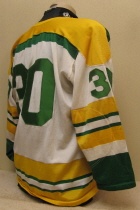 Pete Maxwell & Terry Mulroy #30 1972-74 This jersey is from the Musketeers very first season, 1972-73, as members of the USHL. It was worn two seasons, first by goaltender Pete Maxwell and then Terry Mulroy.