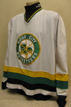 Worn by Chad Buckhard during the 91-92 season. No player NOBs, instead, each jersey was sponsored by a different SC business. This one was sponsored by soon to be computer giant Gateway (2000). Size XL.