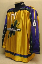 Andrew Rowe #6 Yellow 06-07. This jersey was worn during the 2006-07 season by Andrew Rowe. Manufactured by OT Sports, this size 54 shows nice wear. This was the first season for the yellow jerseys. The Musketeers also wore a special purple jersey for part of the season and a dark green for the road jerseys.