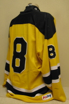Rochester Mustangs Yellow #8 1999-2000 This jersey is from the final Mustang's season, 1999-2000. These were their home jerseys for close to 3 seasons. Its shows terrific wear. Still researching, the NOB has been removed. Manufactured by ProJoy.
