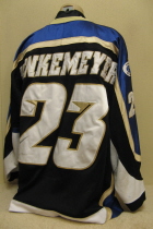 Jim Henkenmeyer Sioux Falls Stamepde 2002-03 #3 Worn during the 2002-03 USHL season. Shows great wear. Made by Gemini and is a size 54. NOB, shoulder patches, USHL & Gemini Crest on front. This style of jersey was worn for the first four seasons. 1999-2000 was Sioux Falls' first season in the league. 