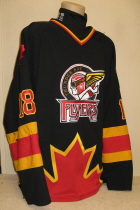 Thunder Bay Flyers Aaron Grynol 99-00 Black #18 This one was worn during the final season for the Flyers. This one is made by CCM, no size tag. 