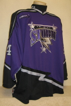 Tri-City Storm Alternate #24 These were the Storm's first alternate jersey. Tri-City plays their games in, Kearney, but represents also Hastings and Grand Island, all in Nebraska. Worn both the inaugural season, 2000-01 and 2001-02. This #24 was worn by Clayton Carson during the 01-02 season. Sized XXL and was made by K1.