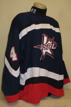 Played in Rochester. USHL All Star Jersey worn Two NHLer's. This is a home USHL All-star jersey number #4. These were also the jerseys the USHL team wore while representing the USA in the annual 4 Nations Tournament. Worn for two seasons, 99-00 and 00-01, the first season it was worn by now New Jersey Devil David Hale in both his first USHL All-Star game and during the 4 Nations Tournament. The second season it was worn by Tampa Bay draft pick Art Femenella during the USHL All-Star game. It is made by Jamin.