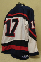 This is a home USHL All-star jersey number #17. These were also the jerseys the USHL team wore while representing the USA in the annual 4 Nations Tournament. Worn for two seasons, 99-00 and 00-01. It is made by Jammin' and sized an XXL. If you have any idea who wore this jersey either season, I would love to have your input. Thanks!!!