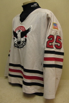This was worn durning the 94-95 season. Has USHL patch and Flag on opositer shoulders as well as sponcer patch in lower hem of jersey. It is made by Hooter 