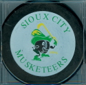 This on is from the 1995-96 season. Has Junior A Tournament hosts on the reverse. Available through the team store only, this style was not used as a game puck. 