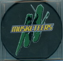 2003-04 & 2004 -05 game style puck. Finally...long over due, new logo game pucks for the Musketeers. (It took me 4 seasons to get rid of the old Puck Man pucks, but I finally did it!!!) These game pucks do have the USHL logo on the reverse. Season 03-04 saw use of both Puck Man and the these logo game pucks. 04-05 this was used strictly as a game puck. these were not available at the team store.