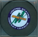 This style Musketeer puck was available through the USHL marketing agreement and not purcahsed at the Musketeer store. (This Style was NOT used in Sioux City during the 2004-05 season) This was the first season that the League issued Official Game pucks. This style is consistant with all eleven teams and carries an official USHL game Puck logo on the reverse. 