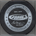 2006-07 Official Game Puck reverse logo. Marked Official Game Puck. This USHL logo has been the official logo on game pucks since the start of the 2004 season. Several teams have also used official game pucks with a sponcer on the reverse as well.